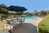 pool with lounge chairs