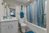 bathroom with shower and tub