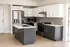 Modern kitchen design with sleek white and gray cabinetry, stainless steel appliances, and a spacious island for culinary creativity.