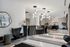 Sophisticated lobby with modern lighting, elegant seating, and a sleek reception desk, offering a warm welcome to guests.