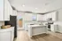 Kitchen with white cabinets and stainless steel appliances