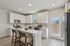 Kitchen with white cabinets and stainless steel appliances