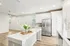 Kitchen with white cabinets and stainless steel appliances