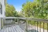 Charming balcony overlooking lush greenery, perfect for enjoying a tranquil retreat.