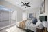 Bright bedroom with elegant decor, featuring a cozy bed, modern ceiling fan, and large sliding glass doors leading to a private balcony.