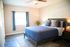 Nordica Flats, interior, Huge master bedroom with plank flooring