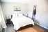 Nordica Flats, interior, Huge master bedroom with plank flooring