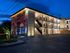 Nordica Flats, exterior, night, parking, entrances, stairs, three levels, mural