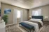 Experience comfort and style in this beautifully designed bedroom.