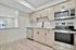 Modern kitchen with sleek stainless steel appliances, elegant wooden cabinetry, and a spacious open layout for comfortable living.
