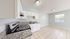 Bright and airy kitchen with modern appliances, granite countertops, and spacious dining area, perfect for culinary enthusiasts.