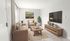 Bright and inviting living room with modern beige sofas, a sleek wooden coffee table, and a wall-mounted TV; ideal for comfortable living and entertaining.