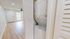 Modern apartment with in-unit washer and dryer, elegant wood flooring, and abundant natural light.