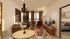 Contemporary living room with stylish decor, cozy seating, and ambient lighting, offering a warm and inviting space perfect for relaxation.