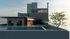 Modern apartment rooftop featuring a sleek glass-walled pool, elegant outdoor seating with umbrellas, and scenic tree views.