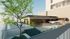 Luxurious rooftop pool area with modern bar, lush greenery, and inviting lounge chairs under stylish umbrellas.