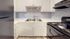 Contemporary kitchen design with elegant mosaic backsplash, stainless steel sink, and modern appliances.