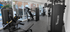 Modern fitness center with state-of-the-art equipment and bright natural lighting.