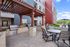 Dog-Friendly Apartments In Chesterfield, MO - The Parq At Chesterfield - BBQ Grill With Picnic Table Covered By Gazebo And Scenic View