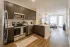 Modern kitchen with dark wood grain style cabinets