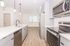 Sleek modern kitchen with elegant pendant lighting.