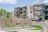Contemporary apartment complex with private balconies, surrounded by lush greenery and convenient outdoor mailboxes.