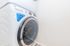 Sleek, modern laundry room featuring a high-efficiency washer with smart control and monitoring capabilities.