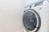 Modern front-loading washing machine with sleek design, adding style and convenience to any laundry space.