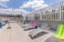 Inviting outdoor pool area with stylish lounge chairs and colorful towels, perfect for a relaxing day in the sun.