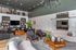 Luxurious and contemporary living room with high ceilings, elegant decor, and stylish seating area, perfect for entertaining and relaxation.