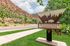 Welcome to Buffalo Valley Apartments, nestled in a picturesque mountain landscape with lush greenery and scenic views.