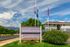 Welcome to Heatherwood Club Apartments, nestled in lush greenery with scenic mountain views, offering a serene and inviting atmosphere.