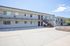 Modern apartment complex with spacious balconies, stylish architecture, and ample outdoor space perfect for relaxation.