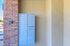 Modern and secure mailboxes set against a charming brick wall, offering convenient and organized mail delivery.