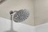 Sleek modern showerhead in a bright, stylish bathroom, promising a refreshing experience.