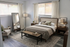 Inviting bedroom with elegant decor, featuring a cozy bed, stylish side tables, and large windows for natural light.