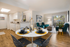 Model apartment kitchen, dining and living areas