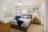 Model apartment primary bedroom