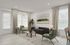 Bright and modern living room with stylish furniture, inviting natural light, and elegant decor.