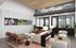 Chic and inviting lobby showcasing modern decor with cozy seating, stylish lighting, and vibrant sports-themed art, perfect for a warm welcome.
