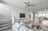 Modern open-concept living space featuring sleek design, stylish furniture, and abundant natural light.