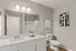 Sophisticated bathroom interior with modern fixtures and minimalist decor.