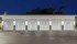 Well-lit row of modern garage doors with clean and stylish design.