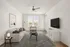 Bright and welcoming living room with modern furniture, large windows, and a stylish ceiling fan.