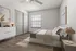 Chic bedroom with modern decor, featuring elegant furniture, soft natural light through a window, and stylish artwork enhancing a cozy ambiance.