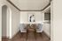 Elegant dining area with a modern wooden table, six stylish chairs, and contemporary artwork, perfect for hosting.