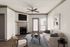 Inviting living room with elegant fireplace, modern furnishings, and stylish decor, offering a cozy atmosphere.