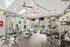 Bright, modern fitness center equipped with state-of-the-art exercise machines, designed for an invigorating workout experience.