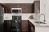 Modern kitchen with sleek dark cabinetry, stainless steel appliances, and elegant granite countertops.