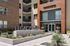 Welcome to Legacy North, a charming leasing center with contemporary architecture and inviting outdoor landscaping at 5765 Bozeman Dr.